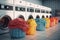 A row of colorful industrial washing machines in a public laundromat. Generative AI