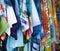 Row of colorful patterned T-shirts hanging up