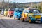 Row of colorful stylish vintage Fiat 126 PanCars rental cars, PanCars is a car rental company