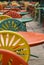 Row of colorful tables and chairs