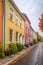 row of colorful townhouses on a charming street
