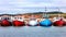 A row of colour fishing boats in the harbour of Havre Aubert, Magdalen Islands, Canada