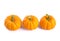 Row of decorative orange pumpkins