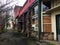 Row of dilapidated buildings on a forgotten sidewalk