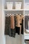 Row of dress hanging on coat hanger