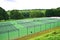 A Row of Empty Tennis Courts
