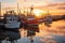 row of fishing boats in a harbor at sunrise