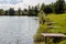 A row of fishing piers on the shore of a fishing pond