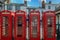 A Row of Four Red Traditional Telephone Boxes in Ripon.