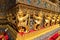 Row of golden garuda scuplture Wat Phra Kaew or the Temple of the Emerald Buddha