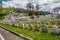 Row of gravestones on grass in cemetary San Diego