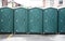 Row of Green Portable Toilets