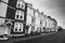 Row of guesthouses and hotels in sunlight along the Esplanade promenade, Weymouth,