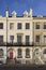 Row of guesthouses and hotels in sunlight along the Esplanade promenade, Weymouth,