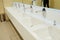 Row of hand washbasins