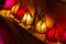 Row of handcrafted colorful glowing lanterns