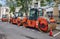 Row of heavy vibratory rollers in the city street ready for asphalt paving, construction and repair equipment: Moscow, Russia -