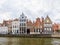 Row of historic gables of houses on Spiegelrei canal in Bruges, Belgium