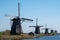 Row of historic windmills at Kinderdijk, Holland, Netherlands, a UNESCO World Heritage Site.
