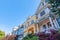 Row of houses in a low angle view with victorian and mediterranean design at San Francisco, CA