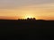 Row of Houses Silhouetted at Sunset