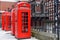 Row of iconic London red phone cabinsLondon, UK