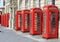 Row of iconic red telephone boxes in Blackpool