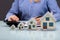 Row Of Increasing House Models On Desk