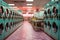 A row of industrial washing machines in a public laundromat.