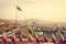 Row of Iran Flags in Front of Tehran Skyline