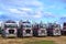 A row of Kenworth big rig trucks