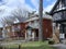 Row of large old  detached brick houses