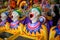 A row of laughing clown faces