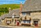 Row of limestone cottages in an English village