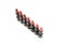 Row of lipsticks of various shades isolated on white