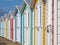 Row of locked English seaside chalets out of season