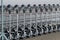 Row of luggage carts / baggage cars at airport