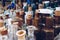 A row of many vintage medicine bottles. Close up selective focus photo of old antique pharmacy glass vials and flasks