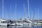 Row of moored sail boats and yachts in a marina in the canary islands