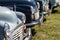 Row of Morris Minor classic car fronts