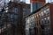 Row of Old Brownstone Homes with Modern Buildings and Construction in Prospect Heights of Brooklyn New York