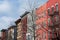 Row of Old Colorful Brick and Wood Residential Buildings in Williamsburg Brooklyn of New York City