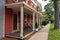 Row of Old and Colorful Buildings and Homes along an Empty Sidewalk in Cold Spring New York