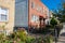 A Row of Old Fenced In Homes in Astoria Queens New York