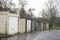 Row of old garage doors in poor council estate