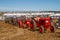 A row of old vintage tractors at show