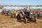 A row of old vintage tractors at show