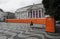 Row of orange loos/toilets in a square in Lisbon