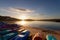 Row of paddle boats,paddle skis or canoes on the beach