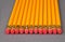 Row of pencils with erasers